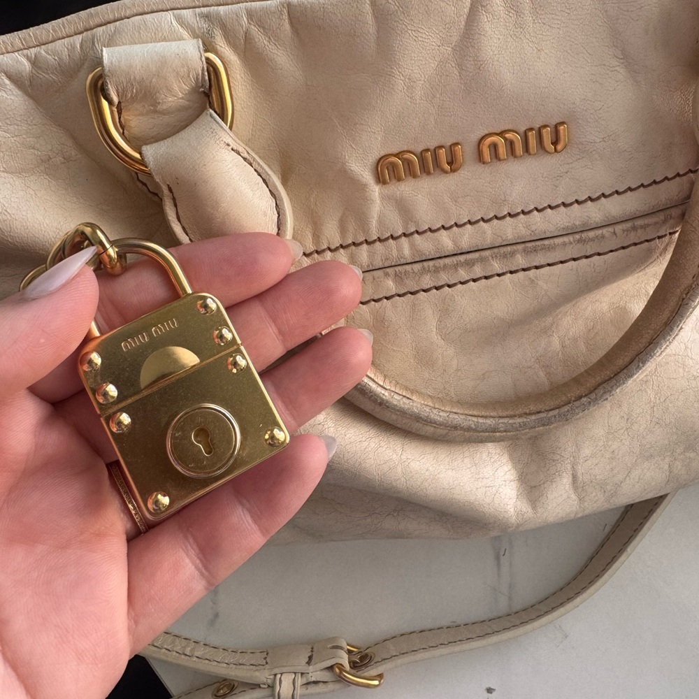 Miu Miu Cream Leather Shoulder Bag with Gold Hardware and Padlock Charm